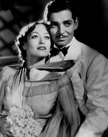 Junto a Clark Gable